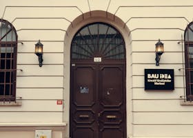 Historic entrance of Bahçeşehir University with architectural details and signage.