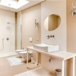 Sleek and contemporary bathroom design featuring a walk-in shower and stylish fixtures.