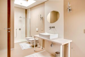 Sleek and contemporary bathroom design featuring a walk-in shower and stylish fixtures.